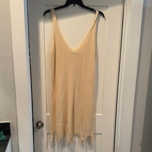 Chic Cream Knit Dress with Fringe Hem